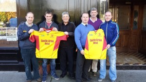 Seosamh Murphy of The Castle Arms Hotel Durrow presents a new set of Jerseys to the Harps GAA Club - October 11th 2014.